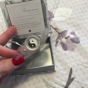 Karma rotating pendent bracelet